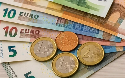Euro coins and Bulgarian lev banknotes symbolizing the currency transition